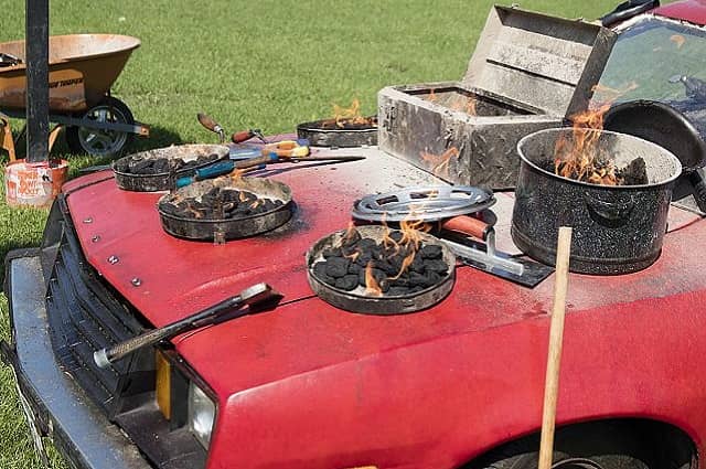 Red Pinto Tailgate Cooking on a Car 